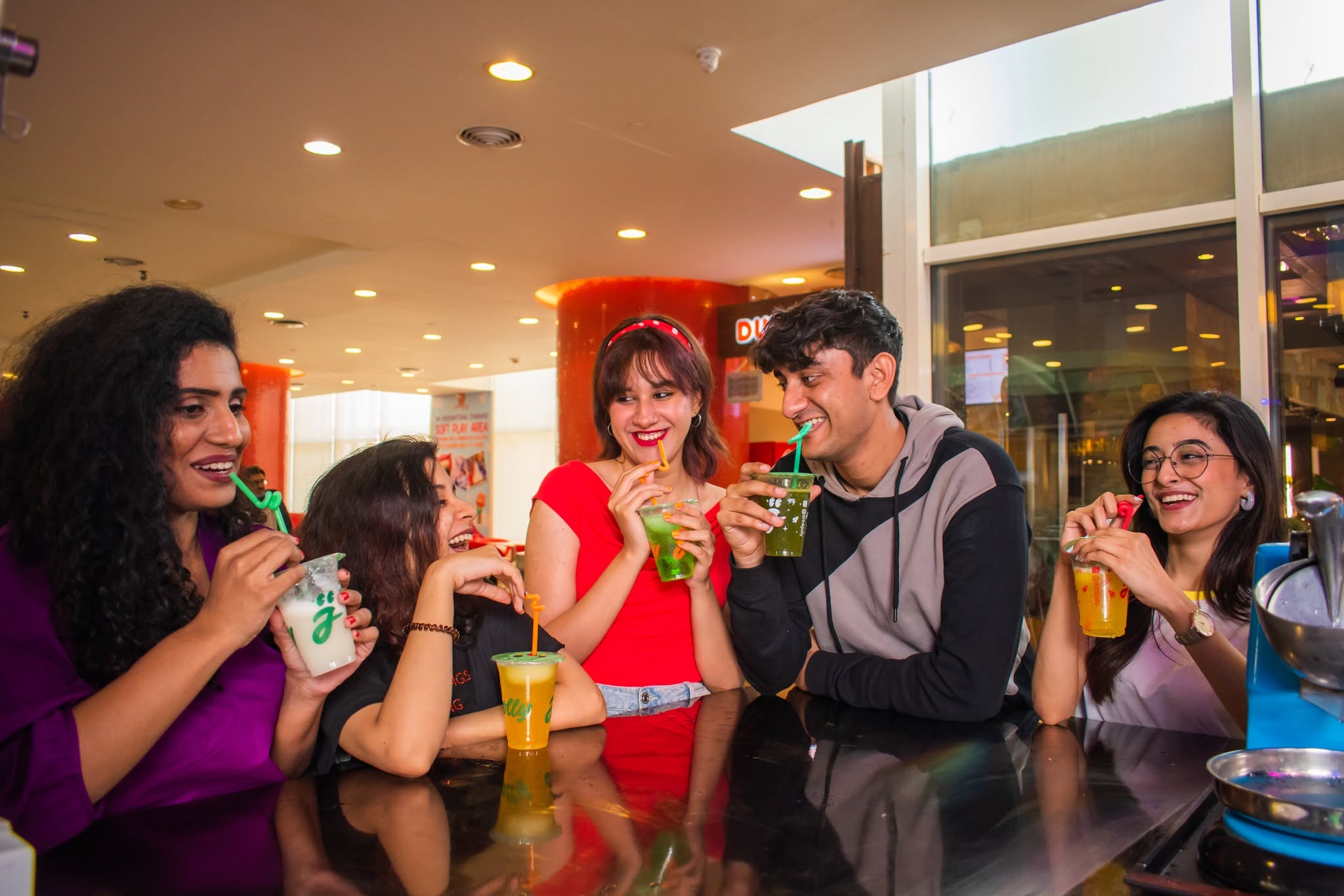 Jolly customers enjoying drinks